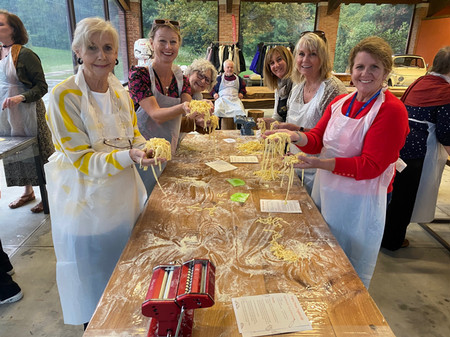 travelers making pasta in Italy