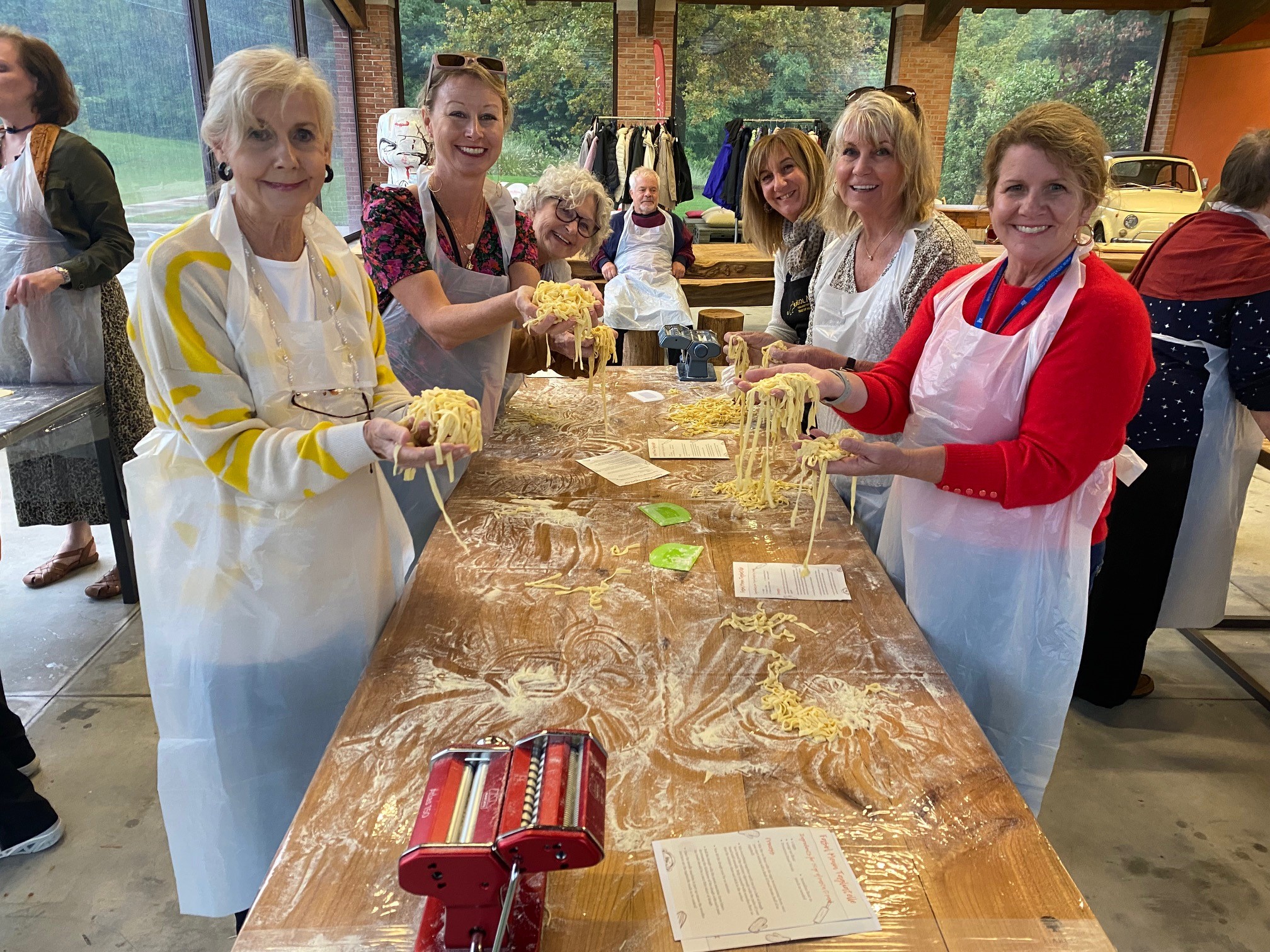 travelers making pasta in Italy