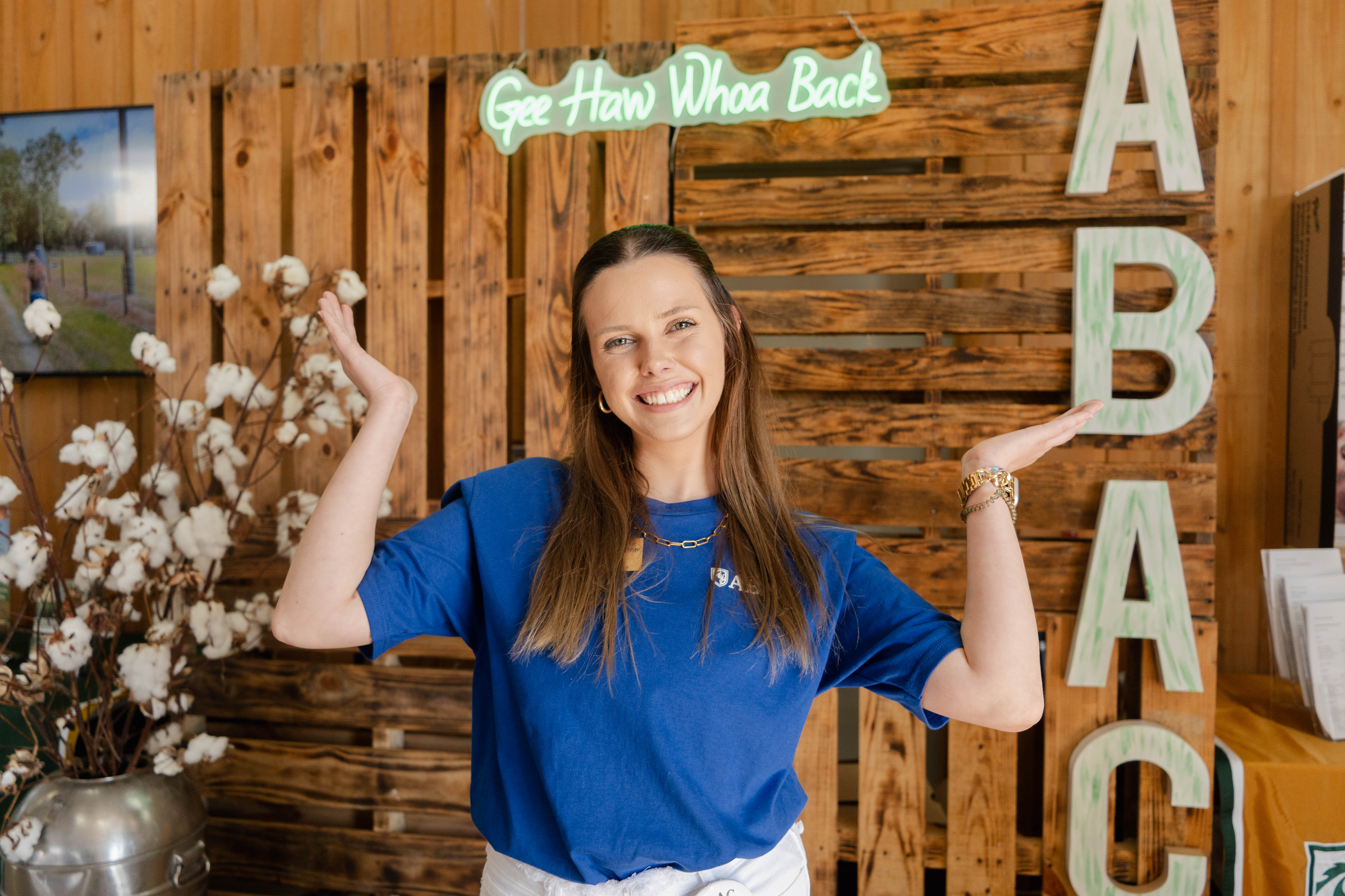 female student in front of ABAC Gee Haw sign