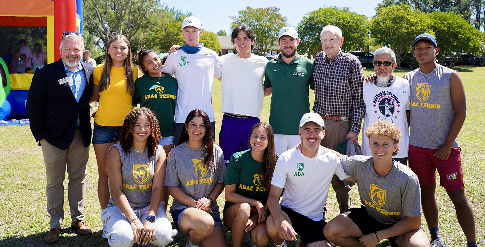 students with Coach Red Hill and Alan Kramer