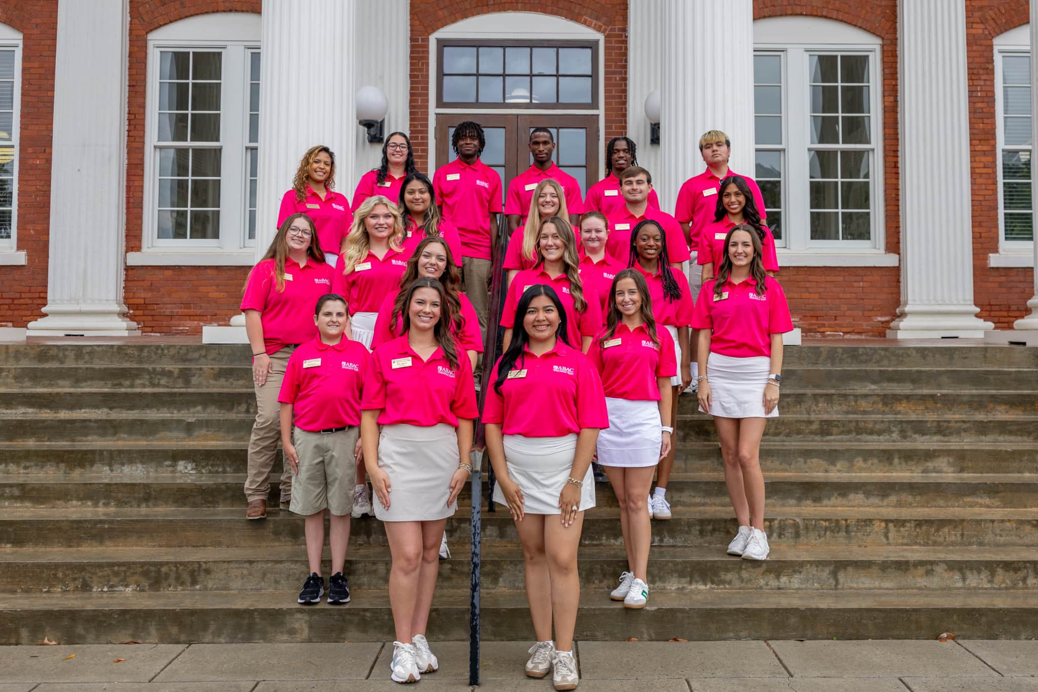 orientation leaders on steps of building