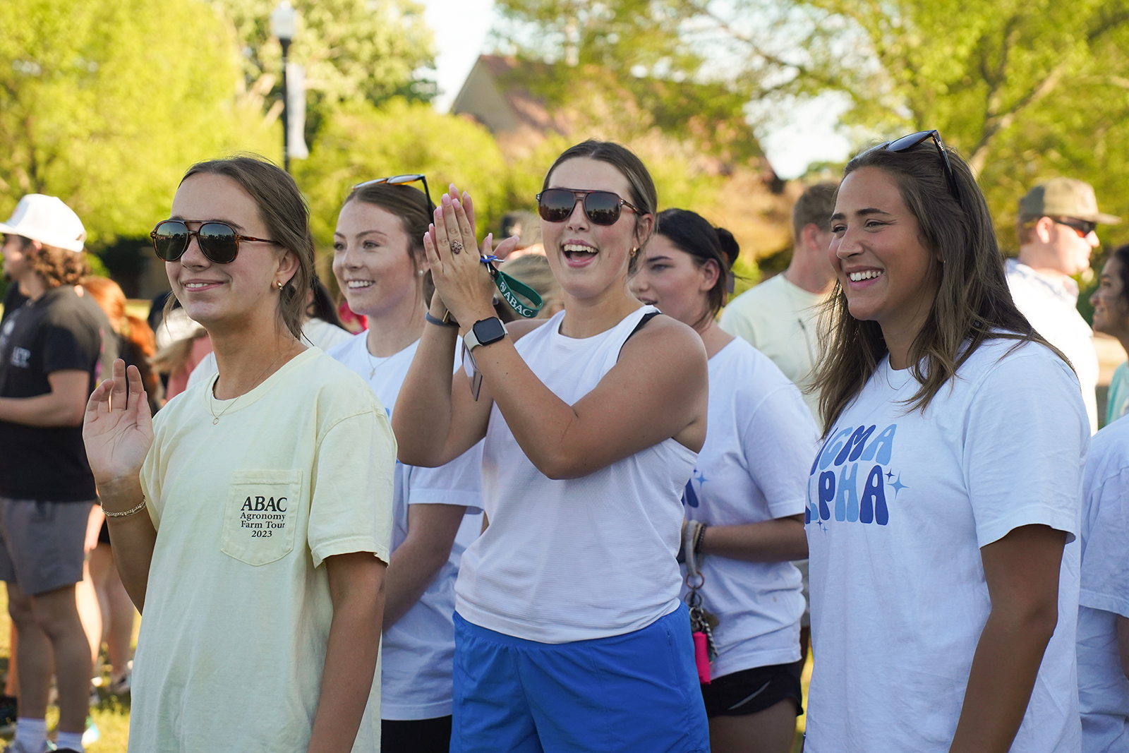 students cheering at an event