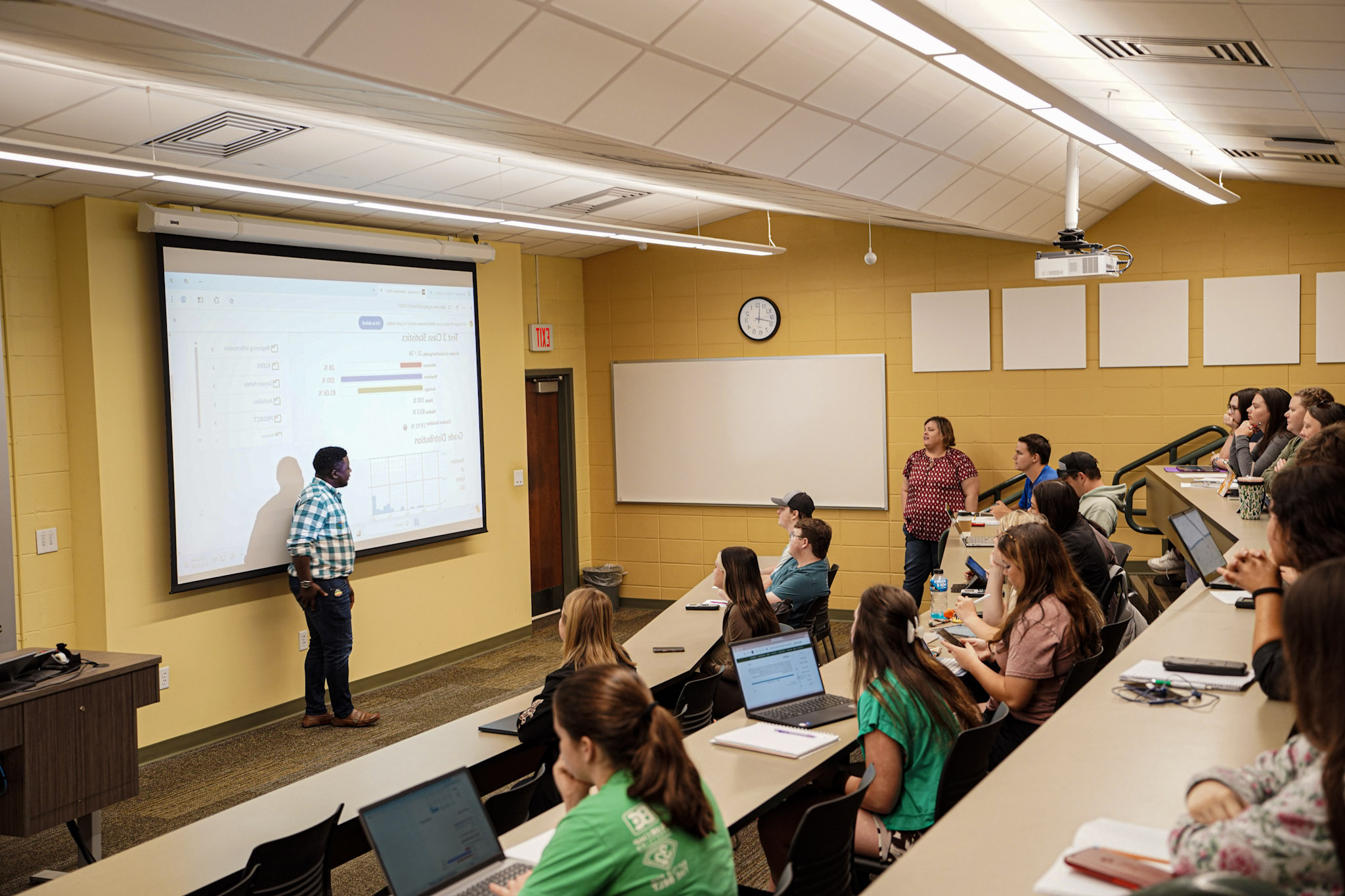 students working at a table.