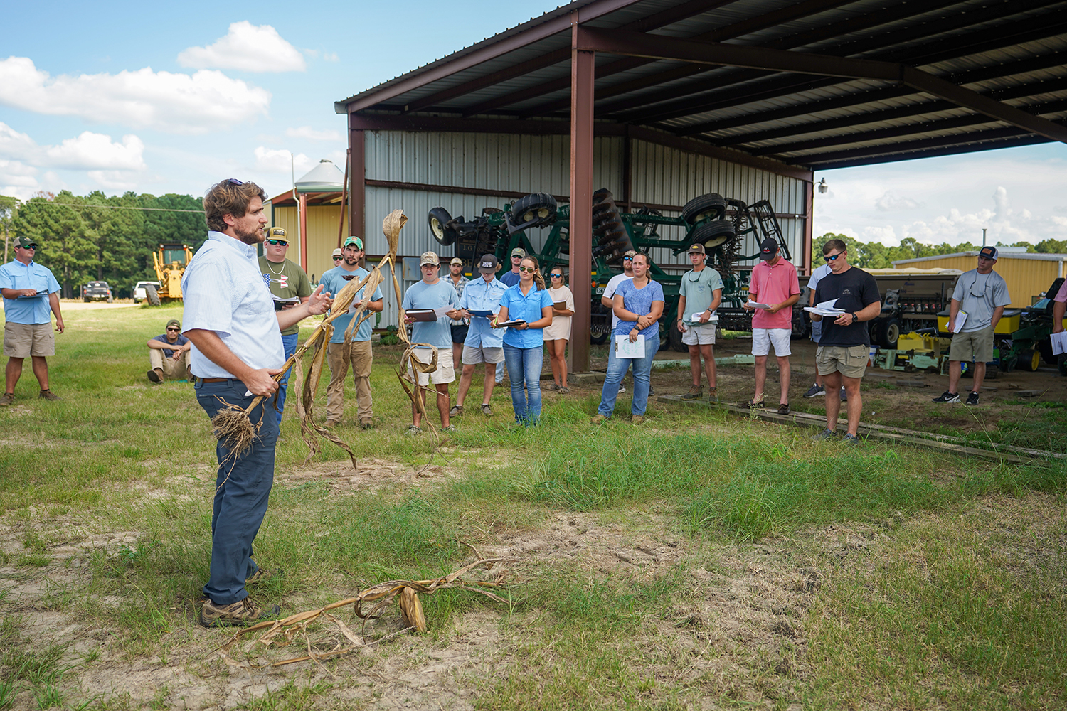 students in an ag class outside
