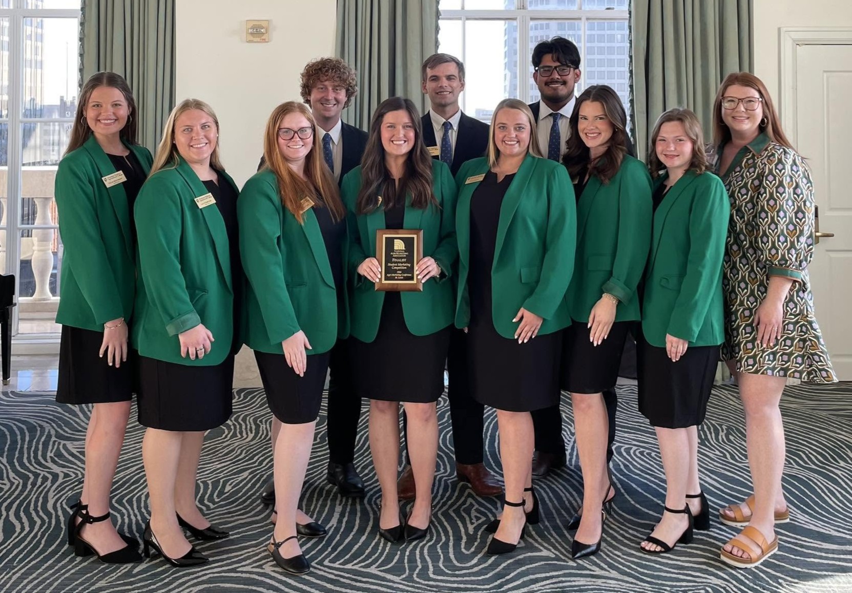 Students holding an award