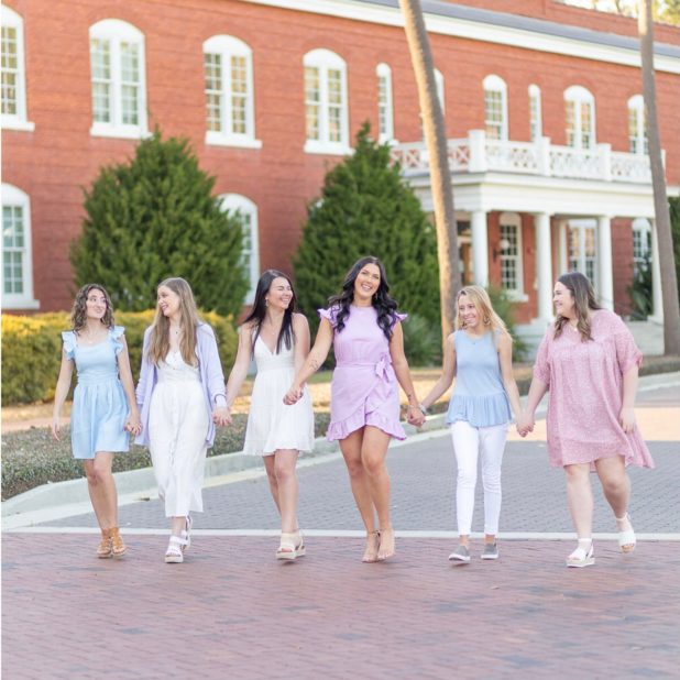 Group of Sigma Alpha Sorority Sisters Walking on campus
